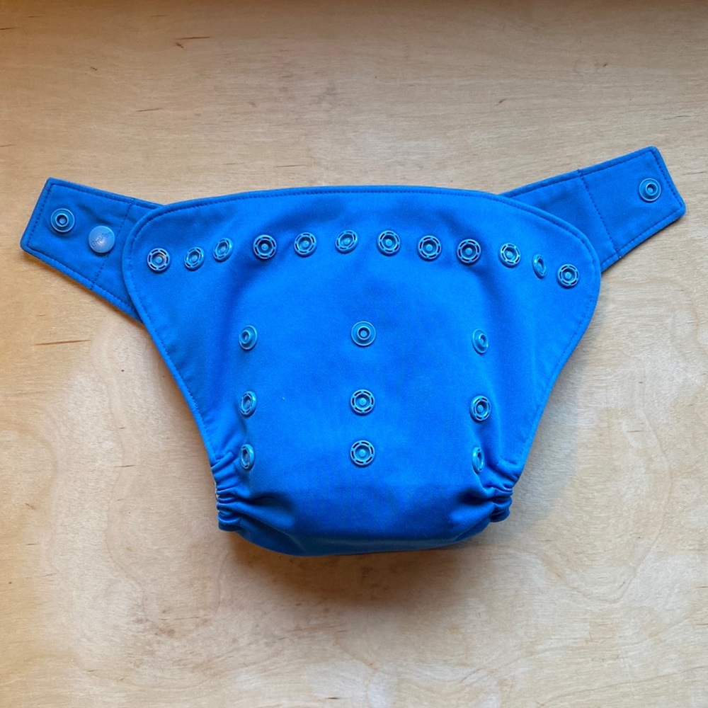 Grovia cloth diaper shell with organic cotton snap in liner